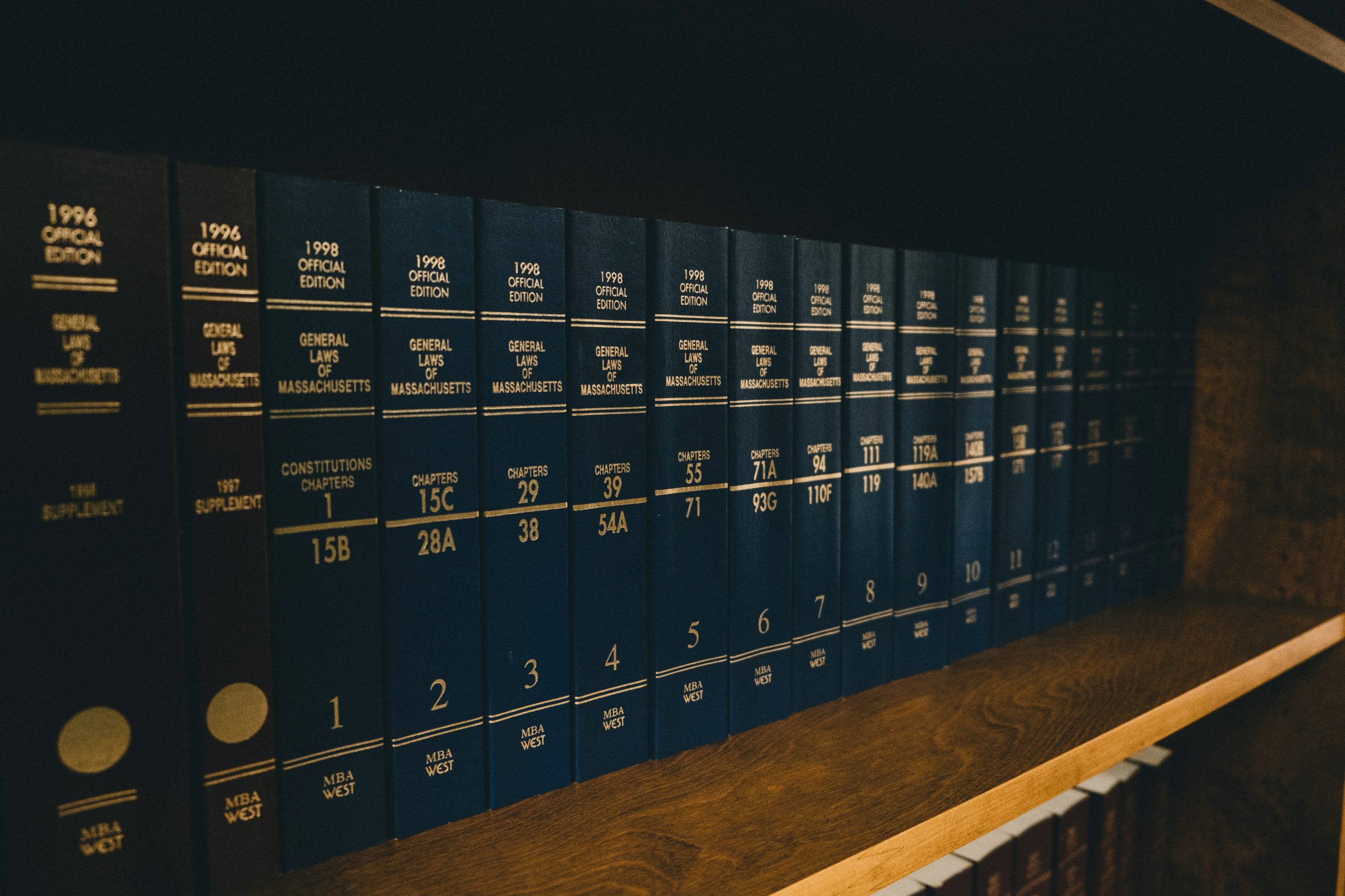 Rows of bound law reports on a library shelf